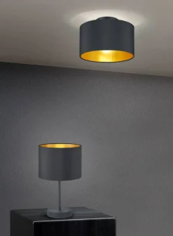 Trio Lighting pöytävalaisin Hostel E27 mattamusta/kulta